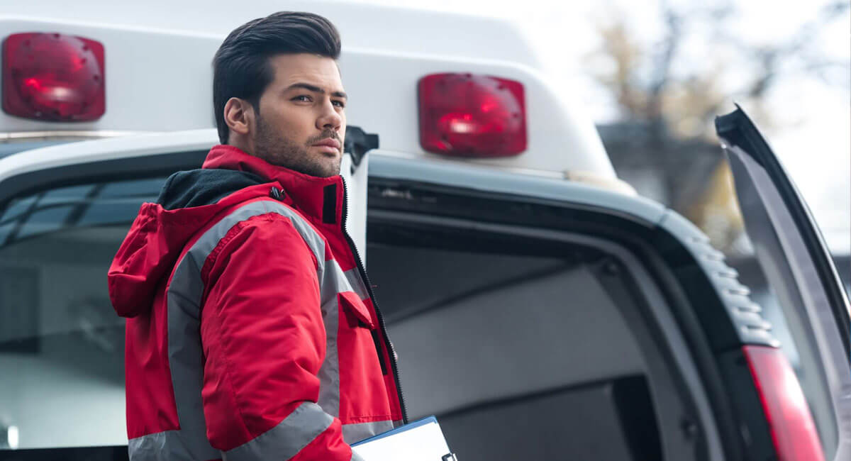 a man dressed in paramedic jacket